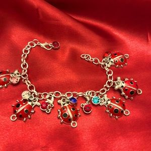 Fun and precious lady bug charm with jewel